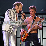 David Lee Roth and Eddie Van Halen on stage rehearsing for Van Halen