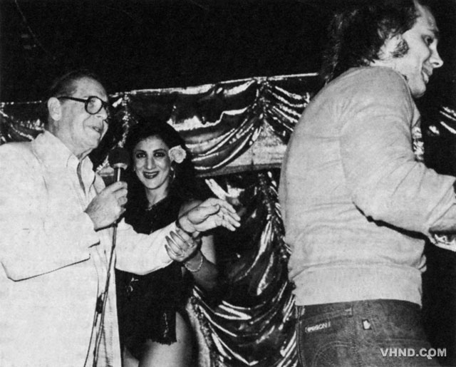 Van Halen's Michael Anthony on stage with Milton Berle and a stripper named Michelle, 1978