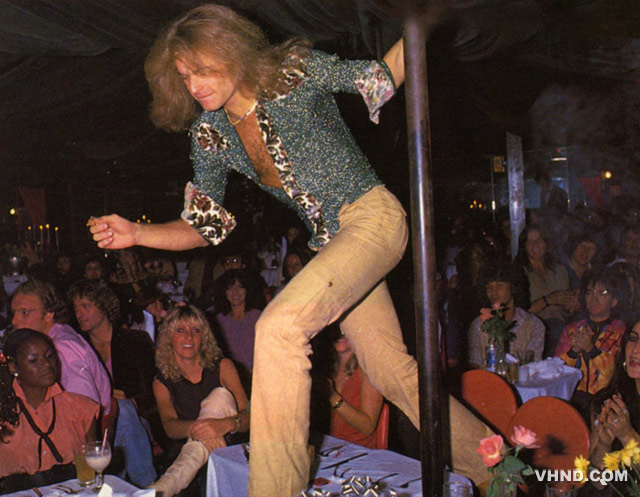 David Lee Roth walking across table at party 1978