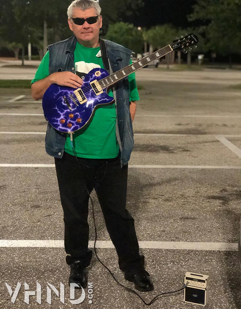 Joe with his newly painted guitar and the EVH 5150 Micro Stack in Ivory